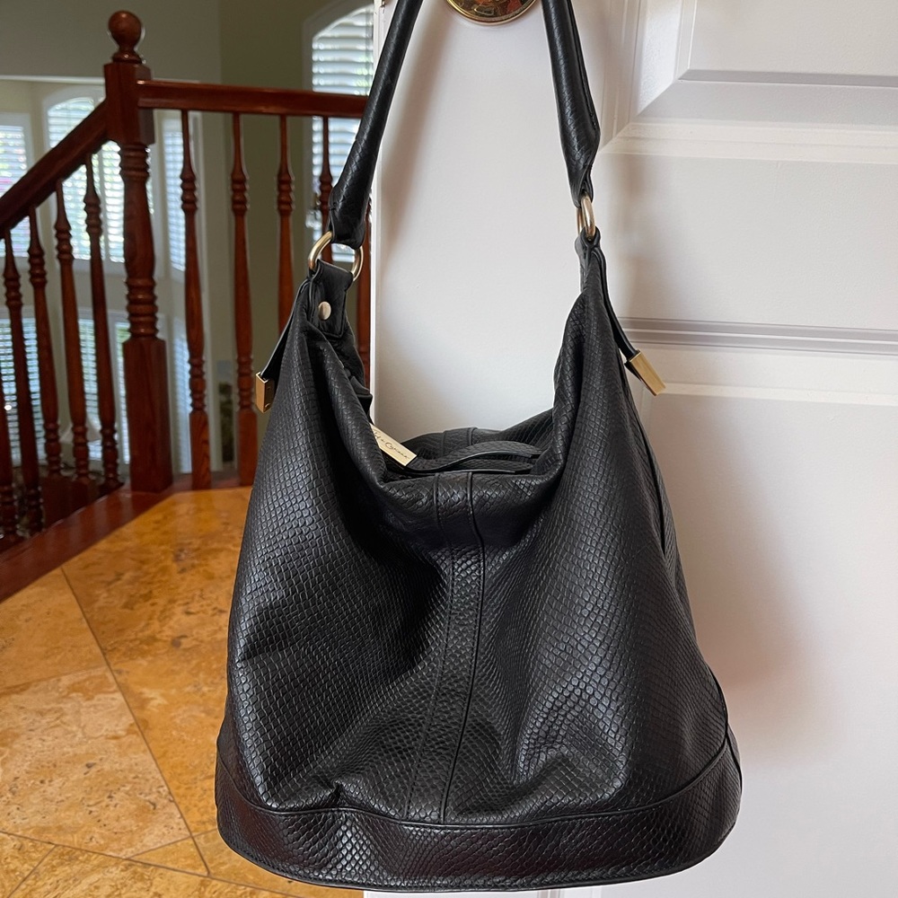 Genuine leather black leather bag from Foly+Corinna. Neiman Marcus. EUC